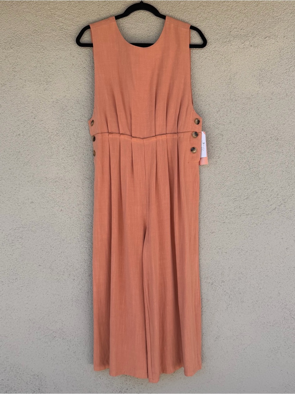 Sadie & Sage Peach Sleeveless Jumpsuit with Side Button Detail